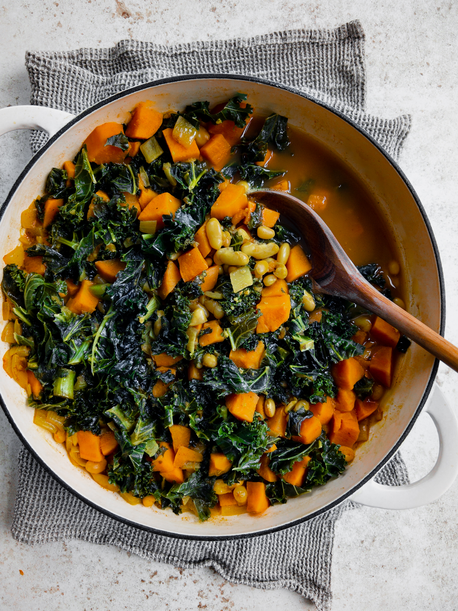 Kale and bean stew with sweet potato
