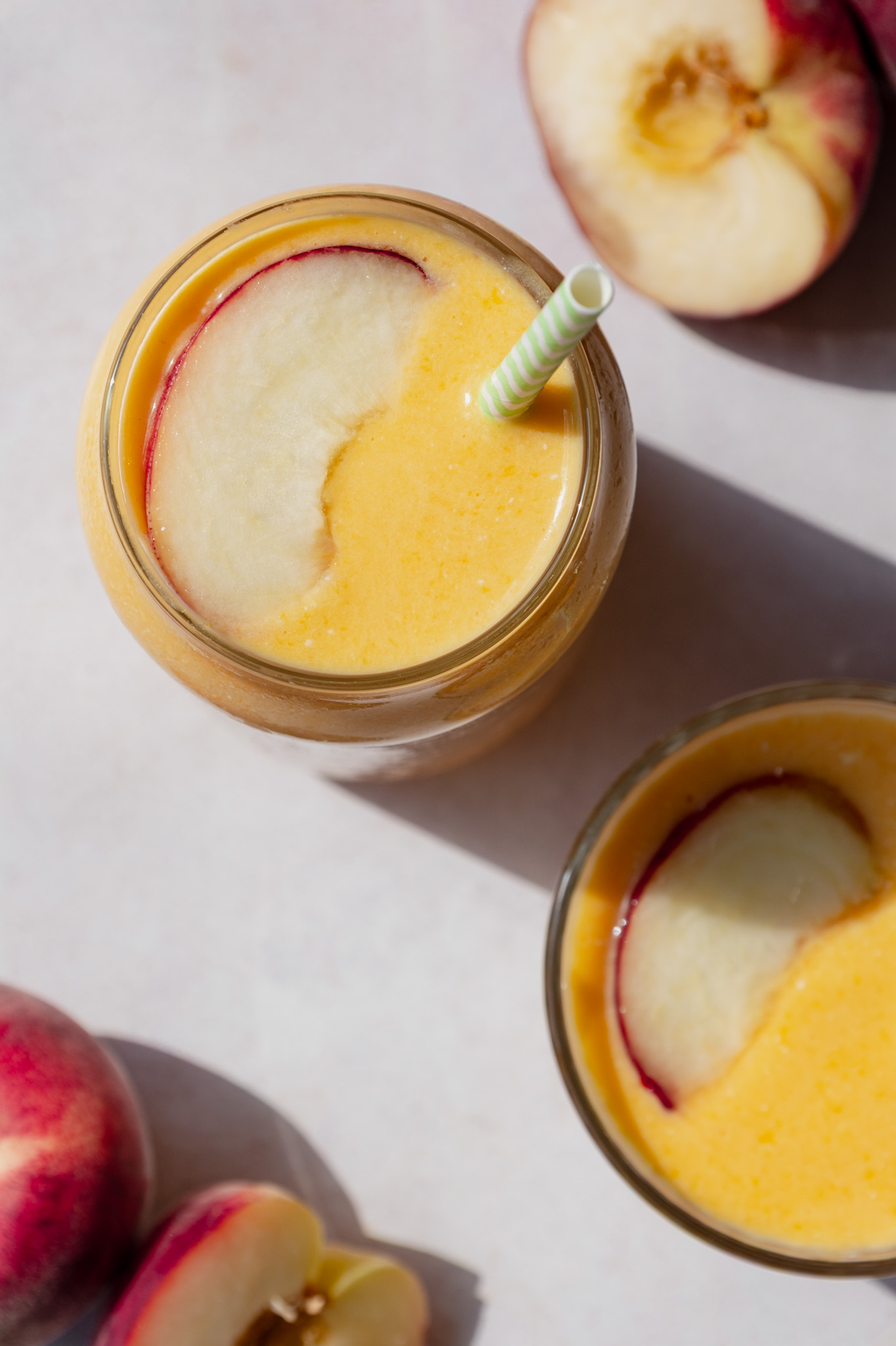 Peach Cottage Cheese Smoothie topped with a peach slice