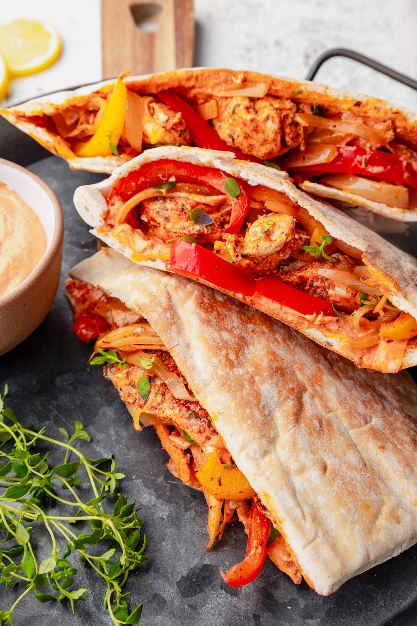 Cajun spiced chicken, peppers and onion in toasted pitta bread