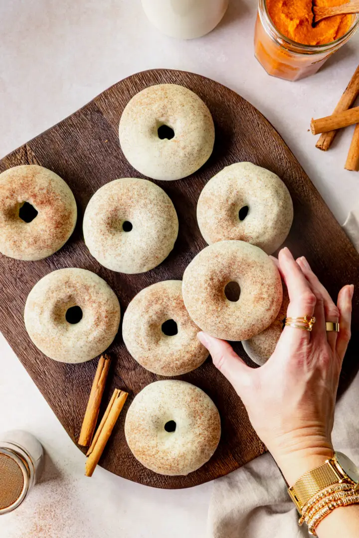 Baked Pumpkin Spice Doughnuts with white chocolate topping
