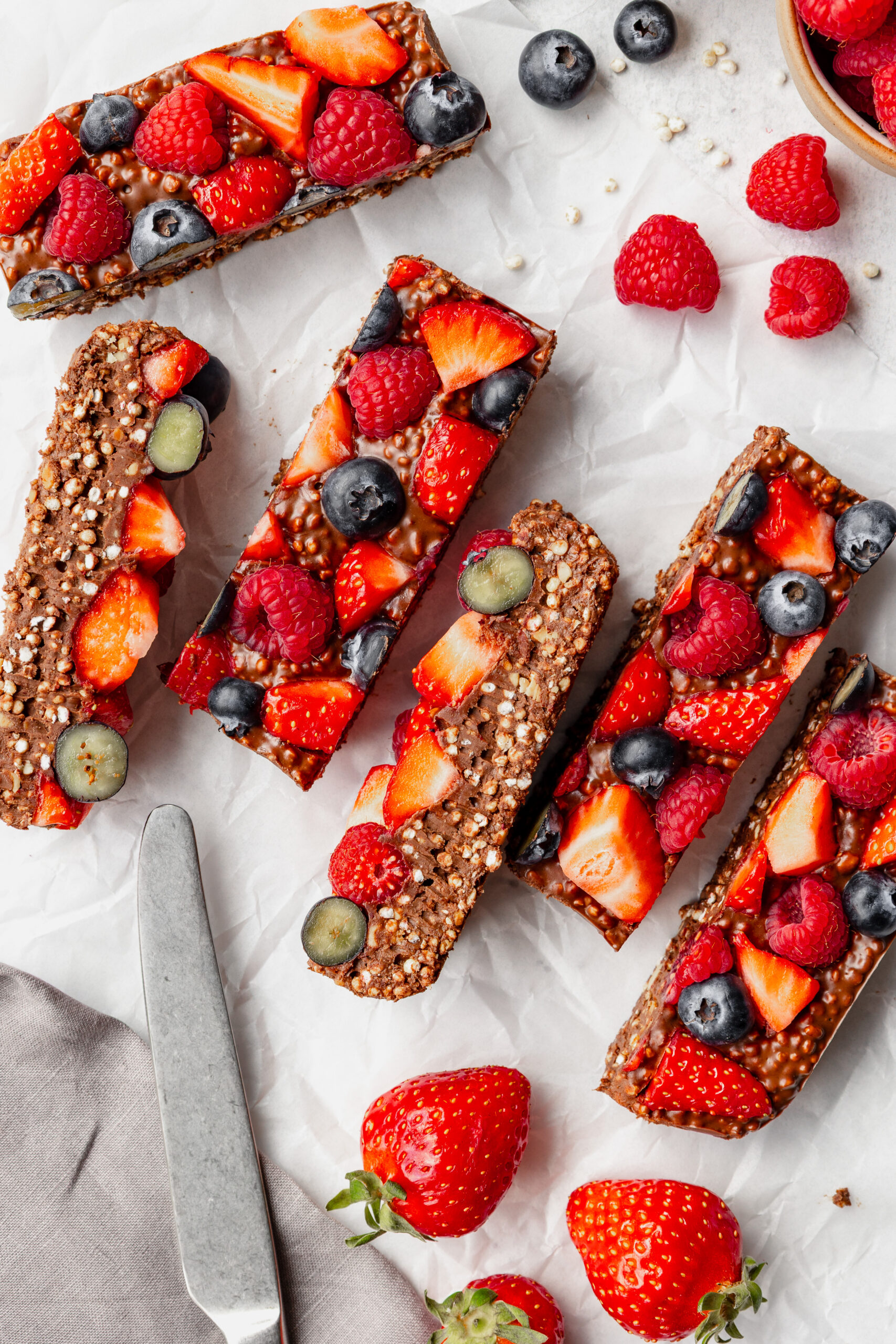 Raspberry chocolate bar with puffed quinoa and peanut butter